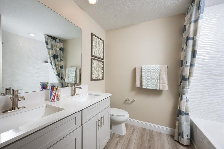 Furnished interior view inside a new home in Pasadena Woods, Wesley Chapel (Image 16).