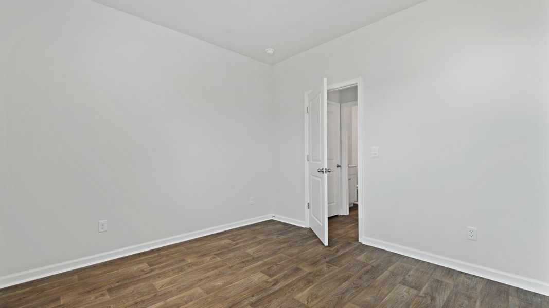 Spacious, unfurnished interior of a new home in Pine Hills at Cane Bay, Summerville (Image 16). Spacious, unfurnished interior of a new home in Pine Hills at Cane Bay, Summerville (Image 16).
