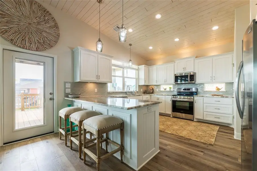Furnished interior view inside a new home in , Crystal Beach (Image 3).