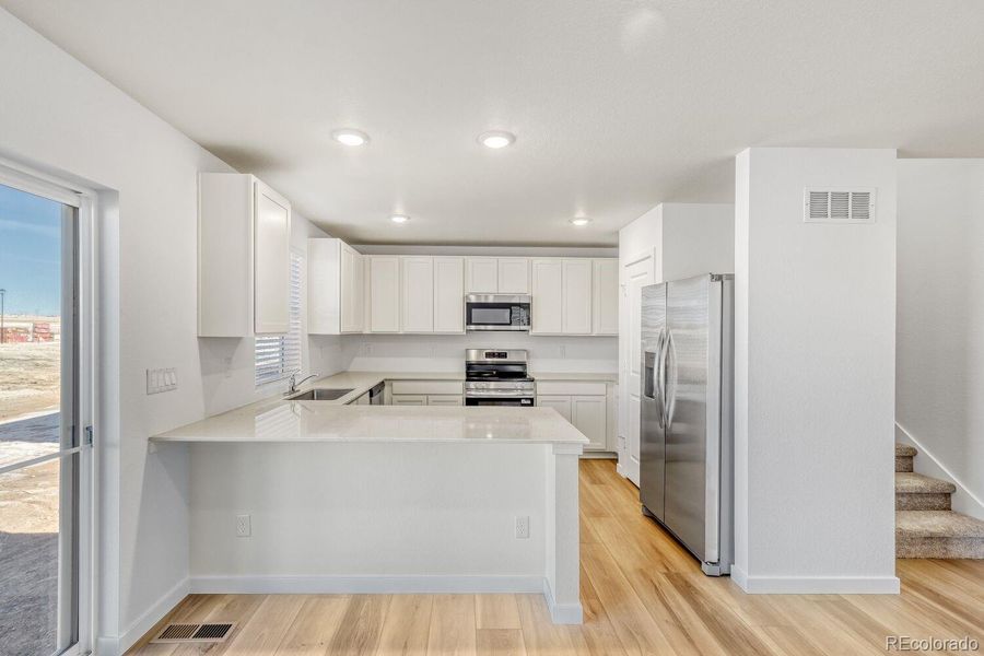 Furnished interior view inside a new home in Percheron, Colorado Springs (Image 4).