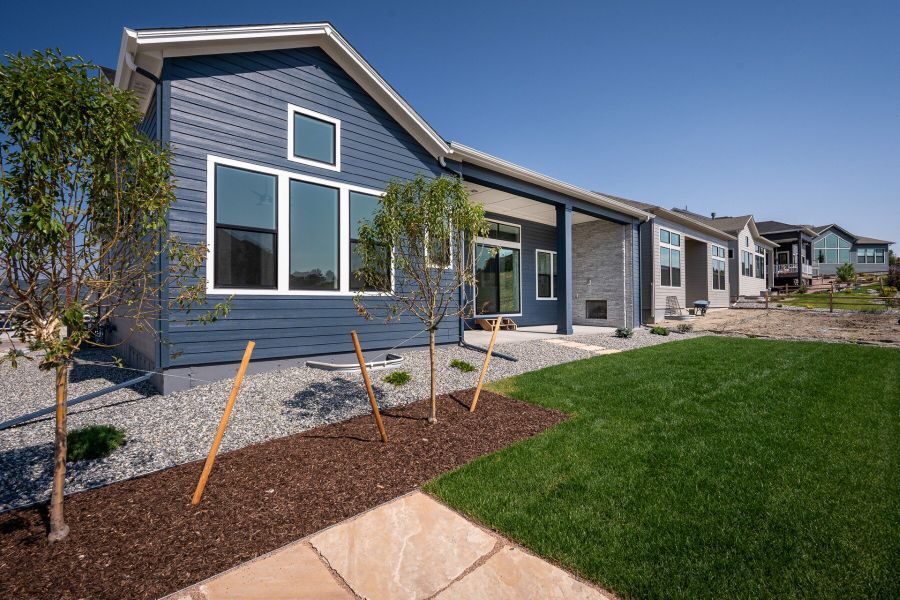 Exterior details and patio area of a home in Cloverleaf - Pinnacle Collection, Monument (Image 3).