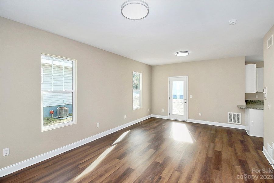 Open living space with access to covered rear porch