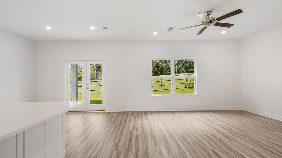Representative unfurnished interior of a home built from the Carol by D.R. Horton in Holley Grove at Peach Creek, Santa Rosa Beach (Image 7).