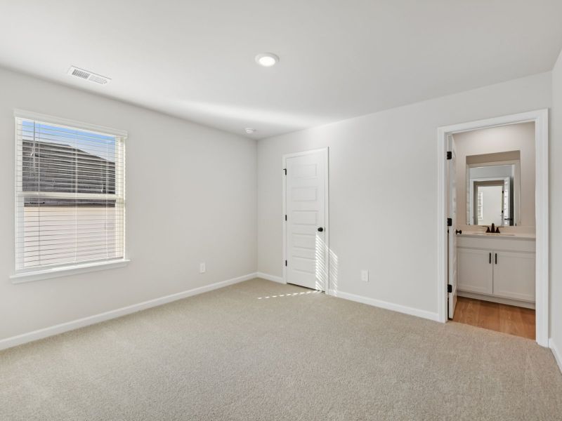 The Taylorsville floorplan with the Divine White interior package.