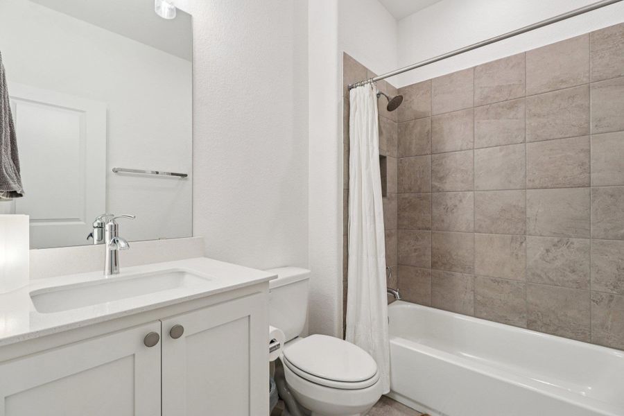Furnished interior view inside a new home in Wolf Ranch West Bend - 70', Georgetown (Image 9).