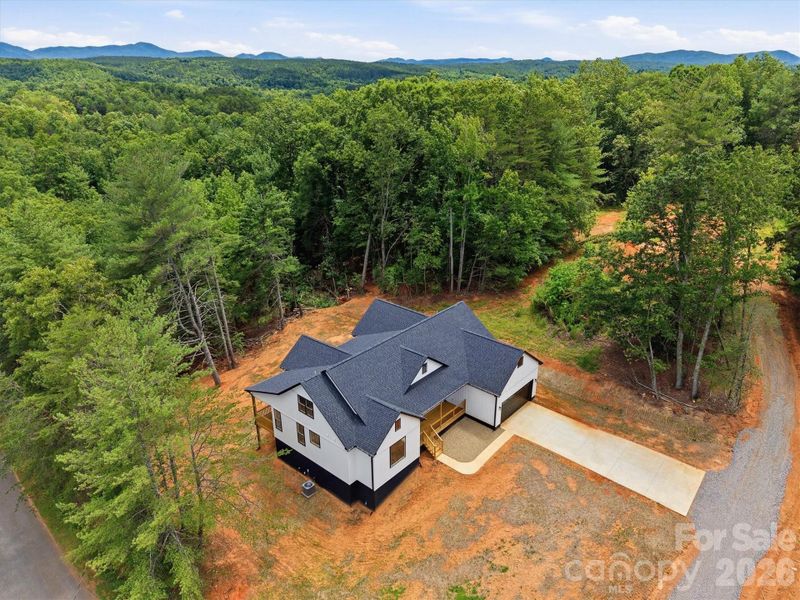 Front exterior of a new home in , Morganton, NC, highlighting curb appeal (Image 21).