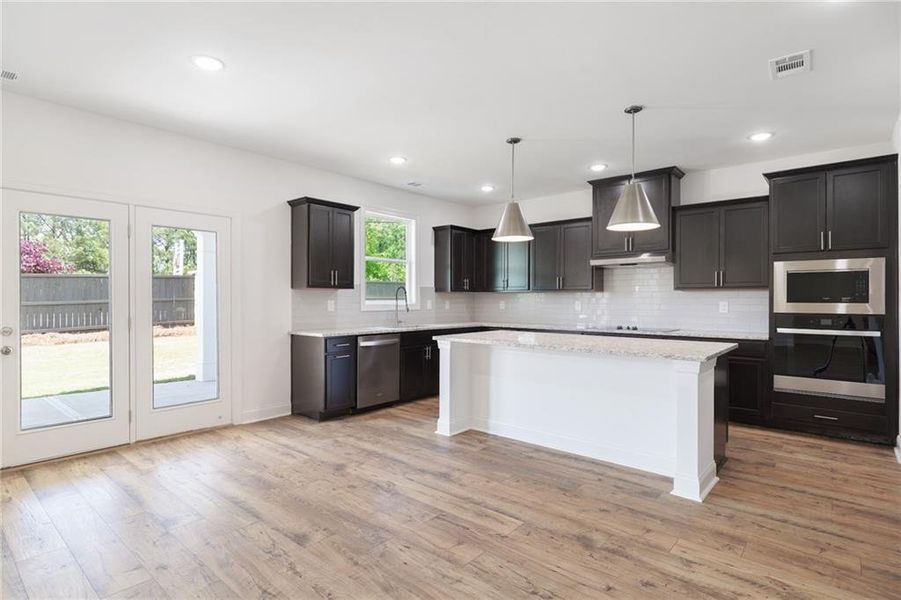 Furnished interior view inside a new home in , Buford (Image 5).