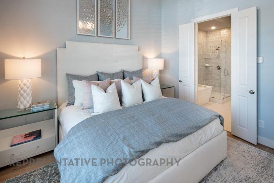 Furnished interior view inside a new home in Bridgeland Central: The Villas, Cypress (Image 11).