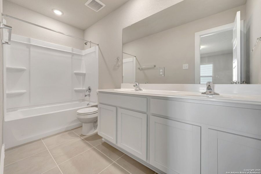 Furnished interior view inside a new home in Winding Brook, San Antonio (Image 9).