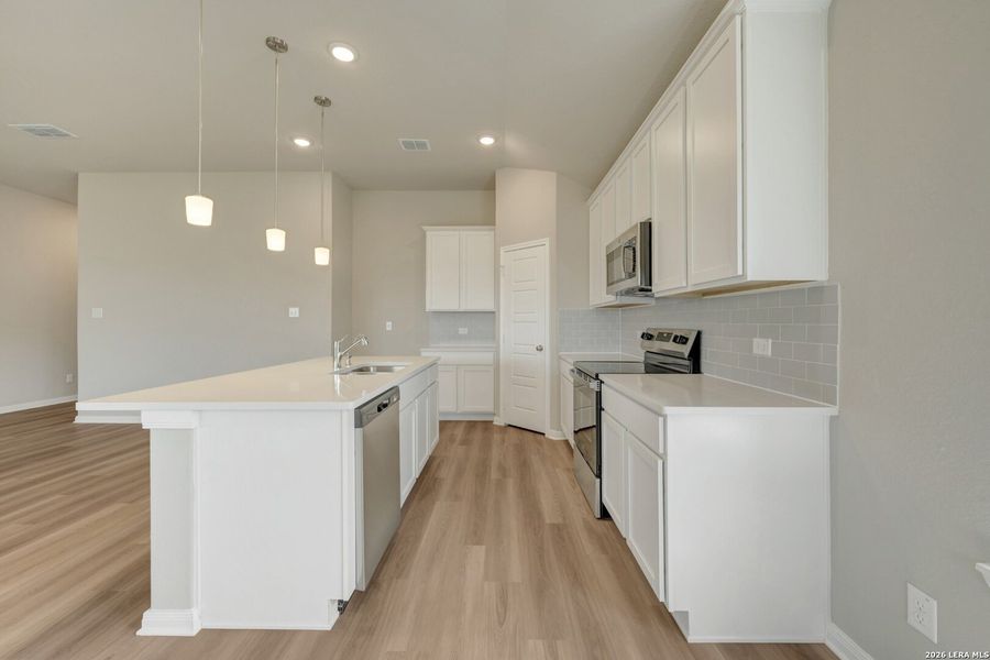 Furnished interior view inside a new home in Greenspoint Heights, Seguin (Image 4).