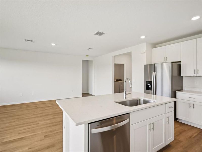 Furnished interior view inside a new home in The Reserve at Van Oaks, Auburndale (Image 9).