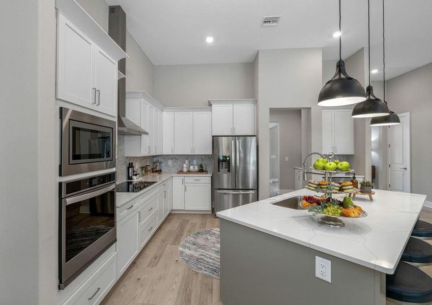 The kitchen includes stunning quartz countertops.