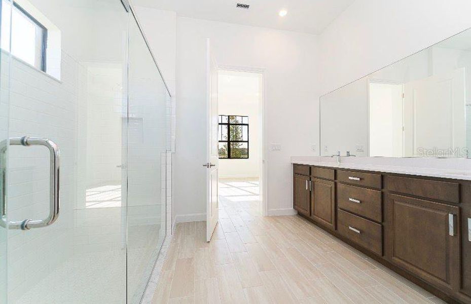 Furnished interior view inside a new home in Tesoro Club, Port St. Lucie (Image 7).