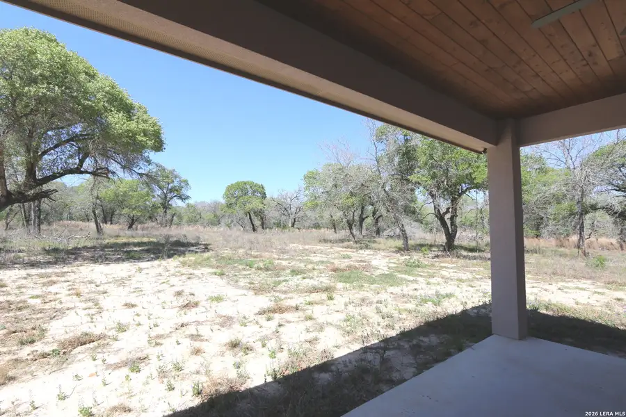 Exterior details and patio area of a home in , Floresville (Image 4).