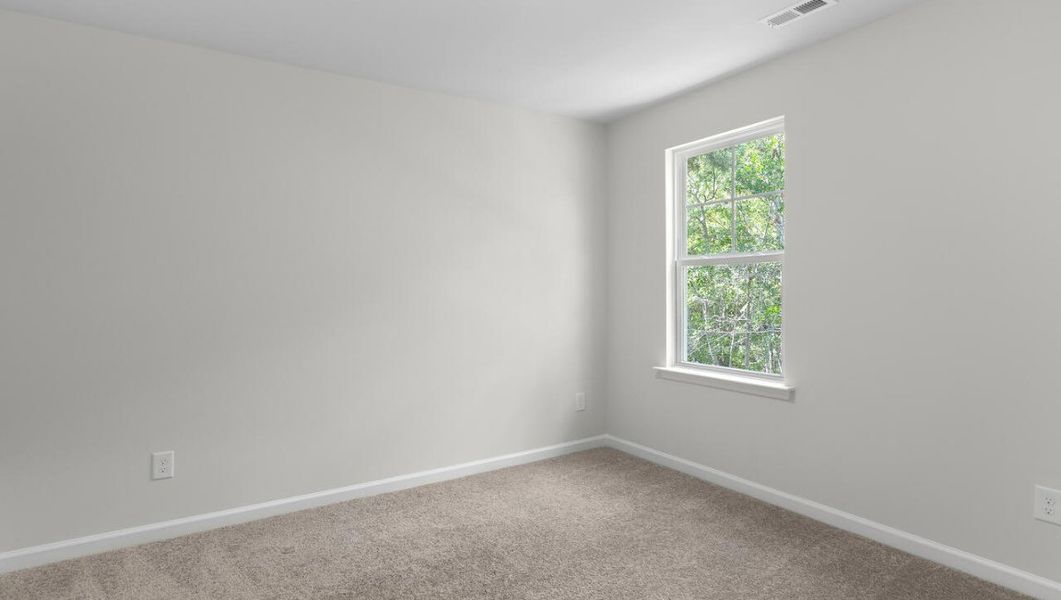 Spacious, unfurnished interior of a new home in The Preserve at Tidewater, Sneads Ferry (Image 33).