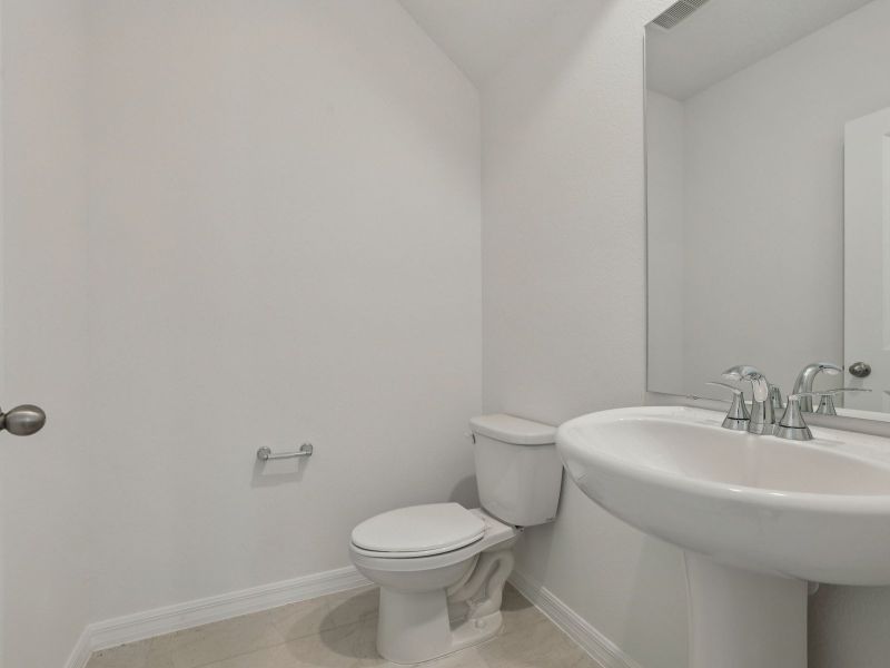 Furnished interior view inside a new home in Bradford Park, Ormond Beach (Image 7).