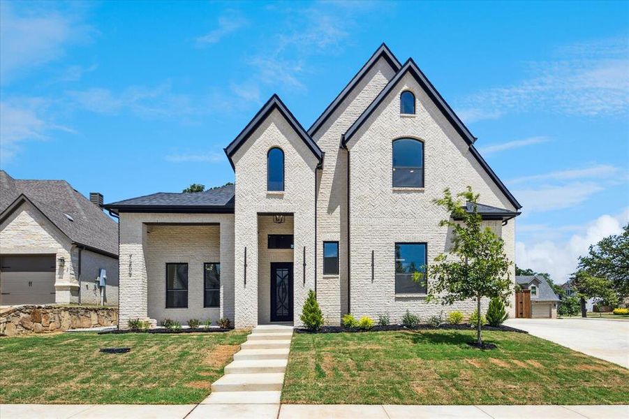 Front exterior of a new home in , North Richland Hills, TX, highlighting curb appeal (Image 2). Front exterior of a new home in , North Richland Hills, TX, highlighting curb appeal (Image 2).
