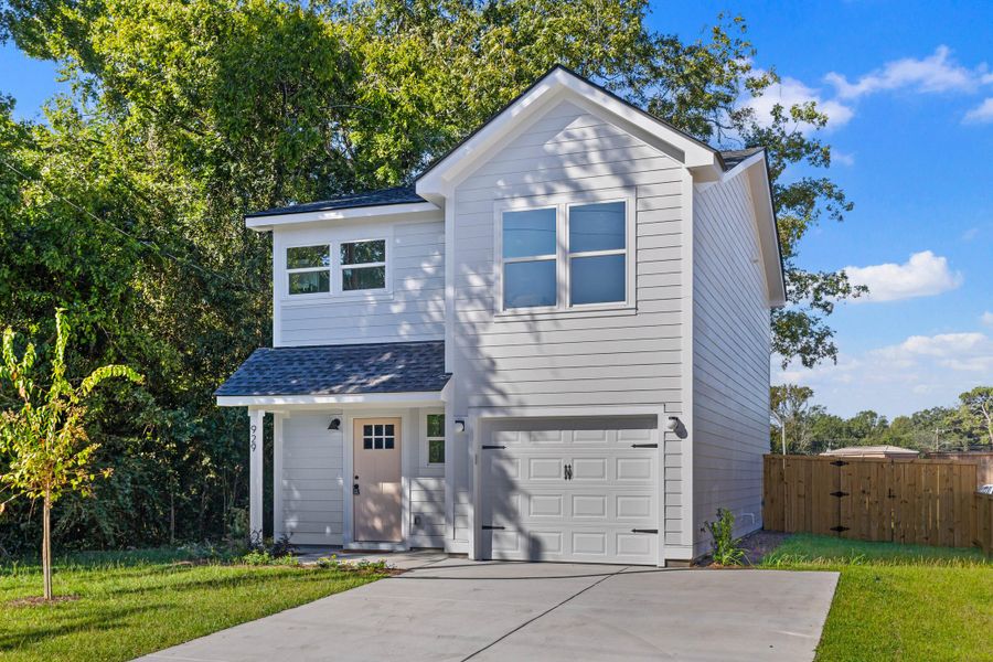 Front exterior of a new home in , Charleston, SC, highlighting curb appeal (Image 24).