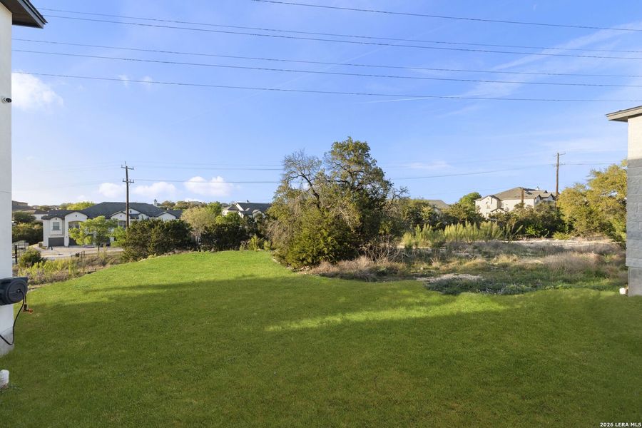 Exterior details and patio area of a home in , San Antonio (Image 32).