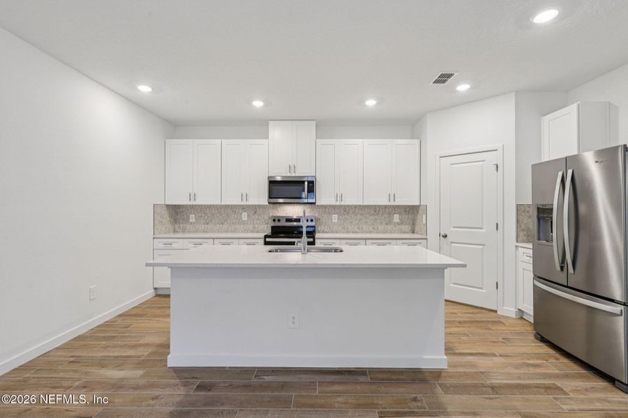 Furnished interior view inside a new home in Colbert Landings, Palm Coast (Image 5).