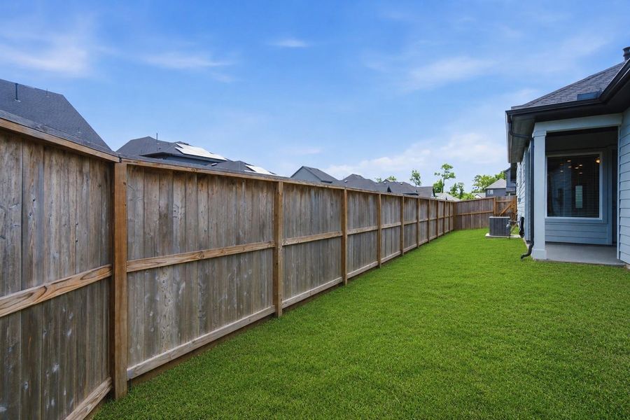 Exterior details and patio area of a home in The Groves 35', Humble (Image 23).