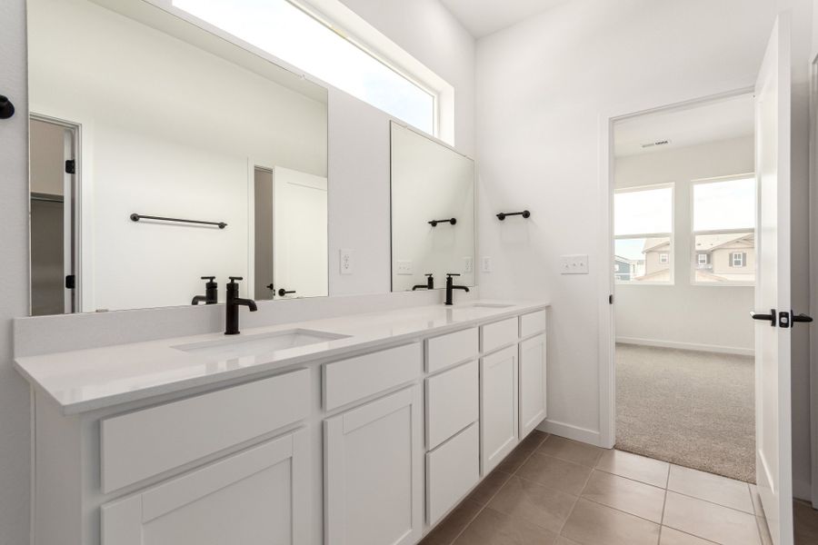 Furnished interior view inside a new home in Painted Prairie, Aurora (Image 9).