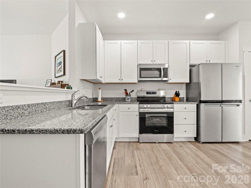 Furnished interior view inside a new home in , Black Mountain (Image 7).
