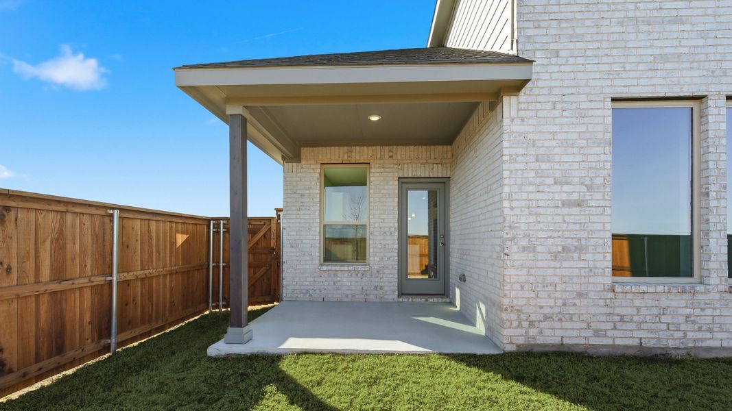 Exterior details and patio area of a home in Green Meadows Premier, Celina (Image 23). Exterior details and patio area of a home in Green Meadows Premier, Celina (Image 23).