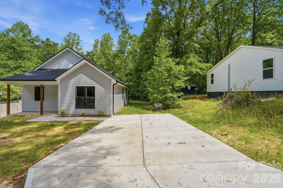 Front exterior of a new home in , Statesville, NC, highlighting curb appeal (Image 22).