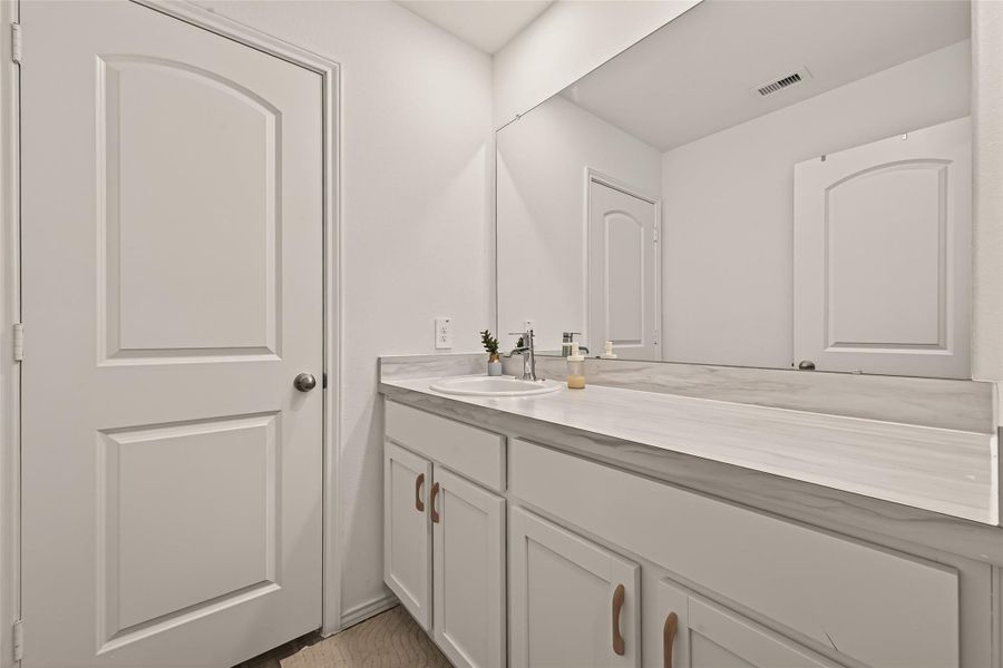 Furnished interior view inside a new home in Grand Pines, Magnolia (Image 9).