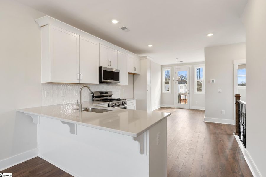 Furnished interior view inside a new home in Renaissance Place, Greenville (Image 4).