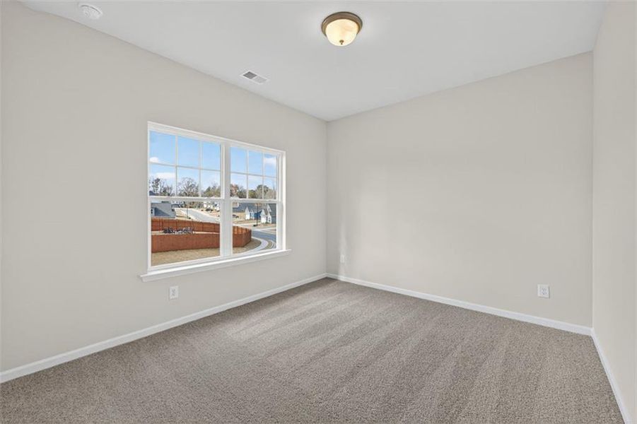 Spacious, unfurnished interior of a new home in Garrett Preserve, Douglasville (Image 30).