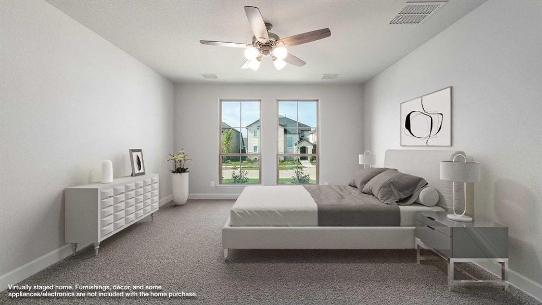 Bedroom featuring carpet and ceiling fan