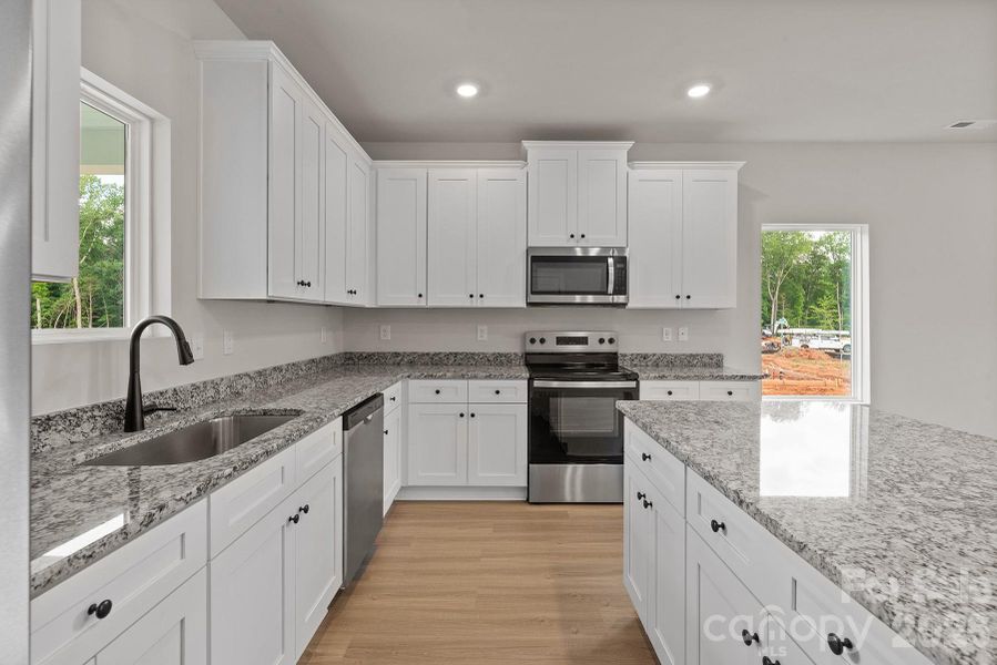 Furnished interior view inside a new home in Ascot Woods, Charlotte (Image 5). Furnished interior view inside a new home in Ascot Woods, Charlotte (Image 5).