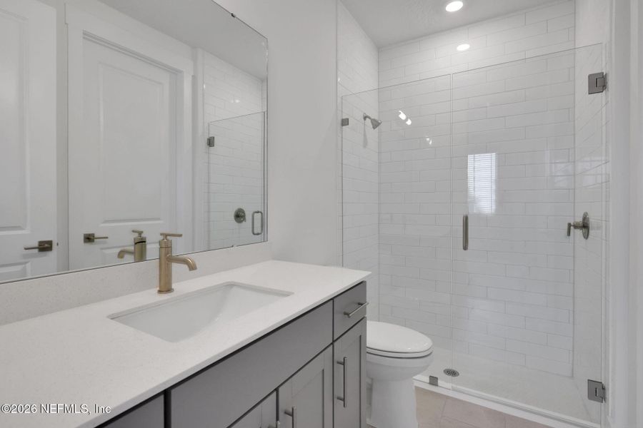 Furnished interior view inside a new home in North Beach Townhomes, Jacksonville Beach (Image 5).
