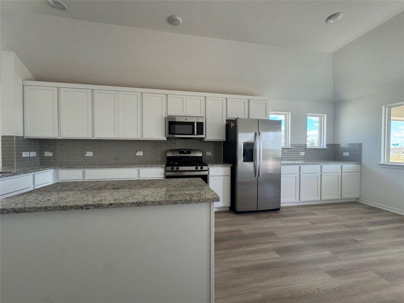 Furnished interior view inside a new home in Village at Three Oaks, Seguin (Image 8).