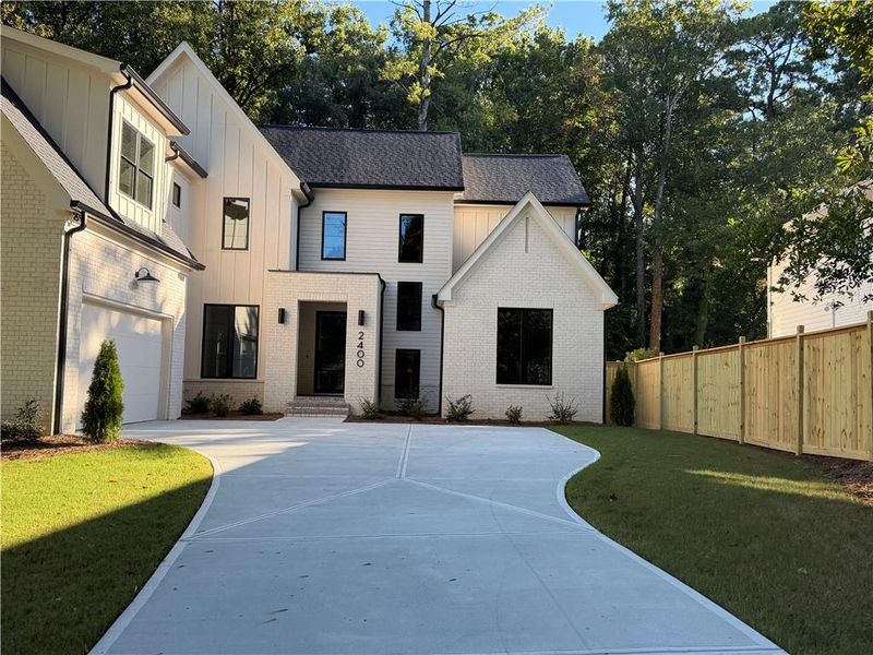 Front exterior of a new home in , Atlanta, GA, highlighting curb appeal (Image 25).