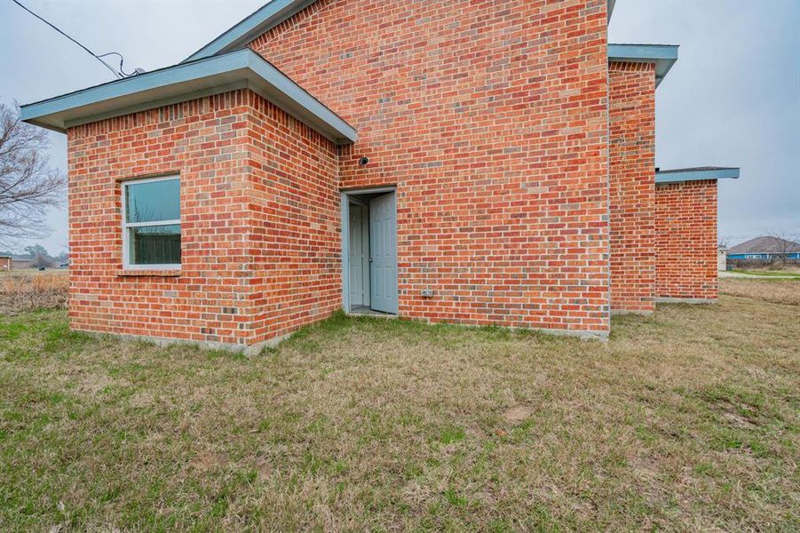 Front exterior of a new home in , Gun Barrel City, TX, highlighting curb appeal (Image 1). Front exterior of a new home in , Gun Barrel City, TX, highlighting curb appeal (Image 1).