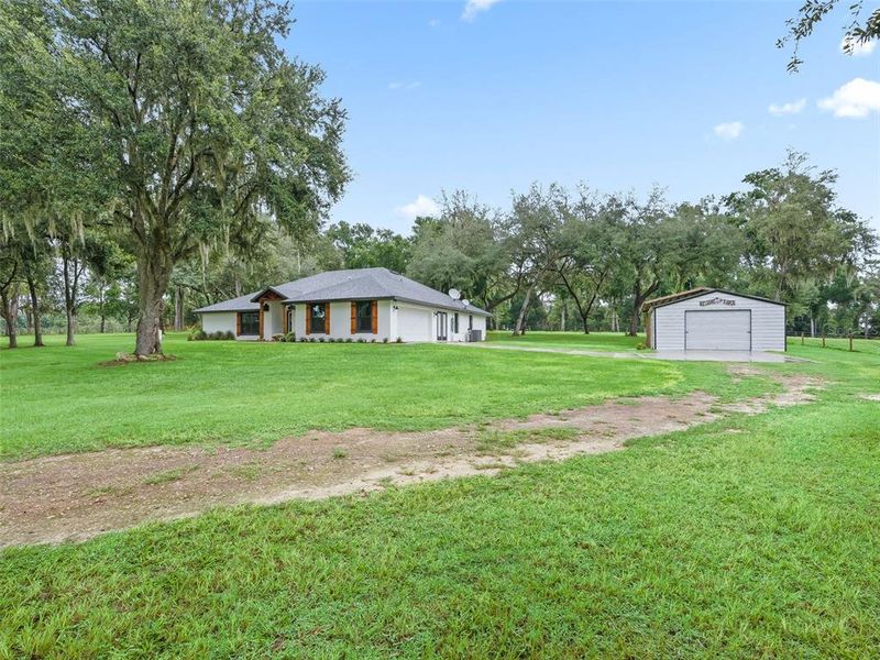Front exterior of a new home in , Bushnell, FL, highlighting curb appeal (Image 24).