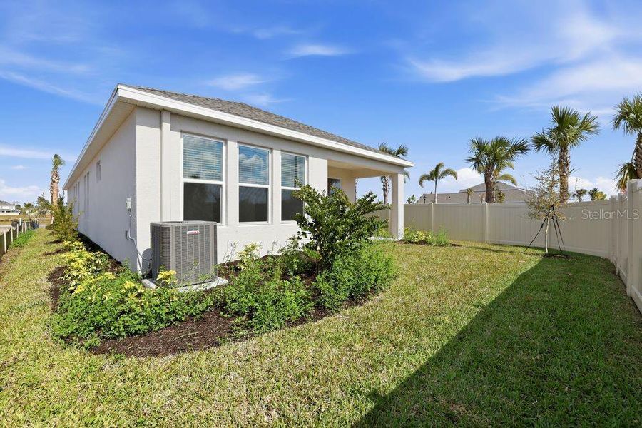 Exterior details and patio area of a home in Indigo Creek, Apollo Beach (Image 3). Exterior details and patio area of a home in Indigo Creek, Apollo Beach (Image 3).
