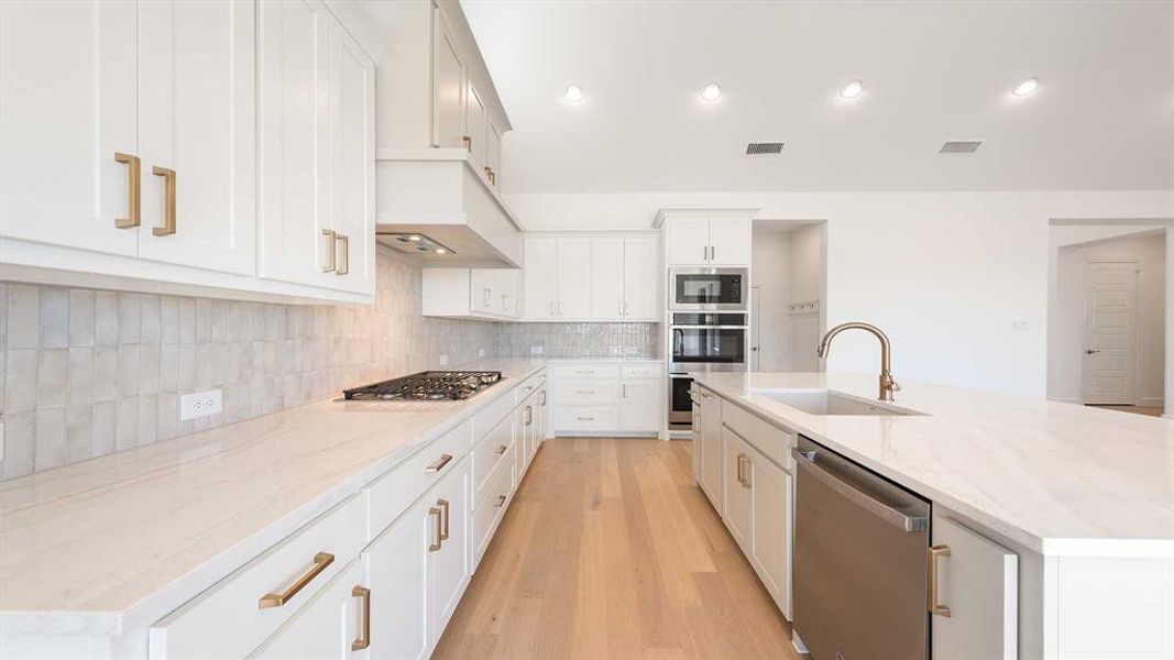 Furnished interior view inside a new home in Terraces 72', Rockwall (Image 9). Furnished interior view inside a new home in Terraces 72', Rockwall (Image 9).