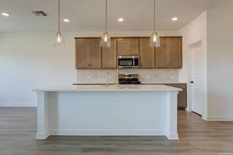 Furnished interior view inside a new home in Nopal Valley, San Antonio (Image 14).