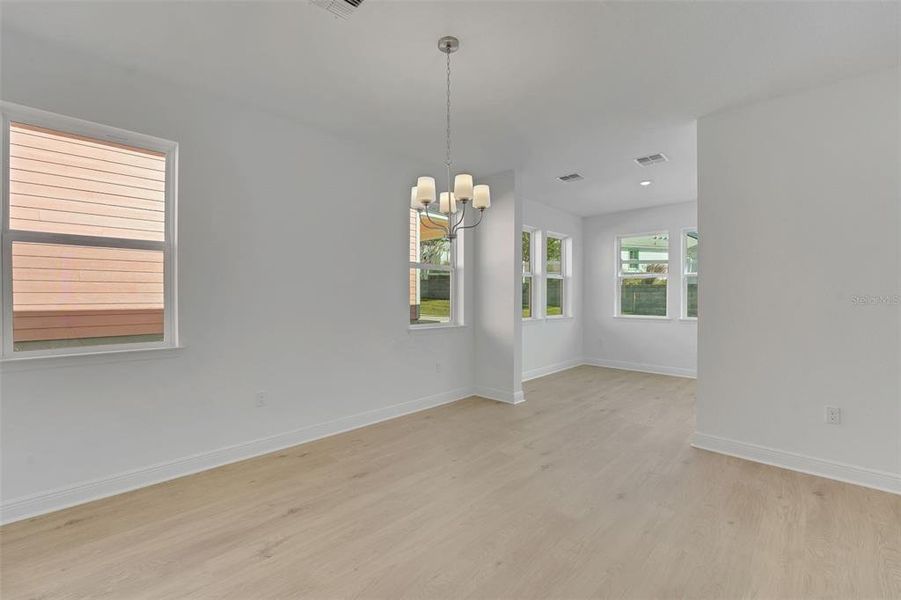 Spacious, unfurnished interior of a new home in Green Key Village, Lady Lake (Image 28).