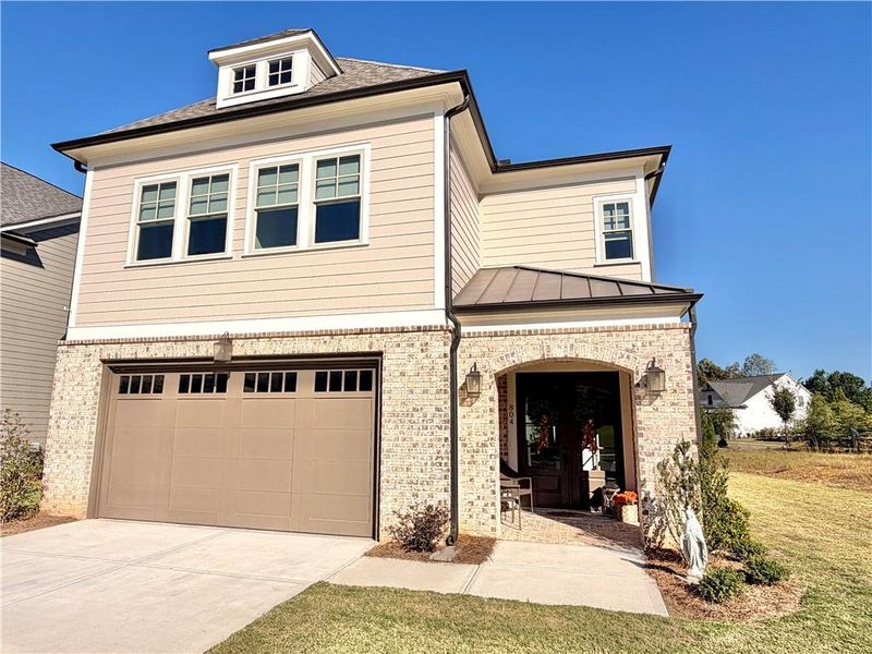 Front exterior of a new home in , Canton, GA, highlighting curb appeal (Image 2). Front exterior of a new home in , Canton, GA, highlighting curb appeal (Image 2).