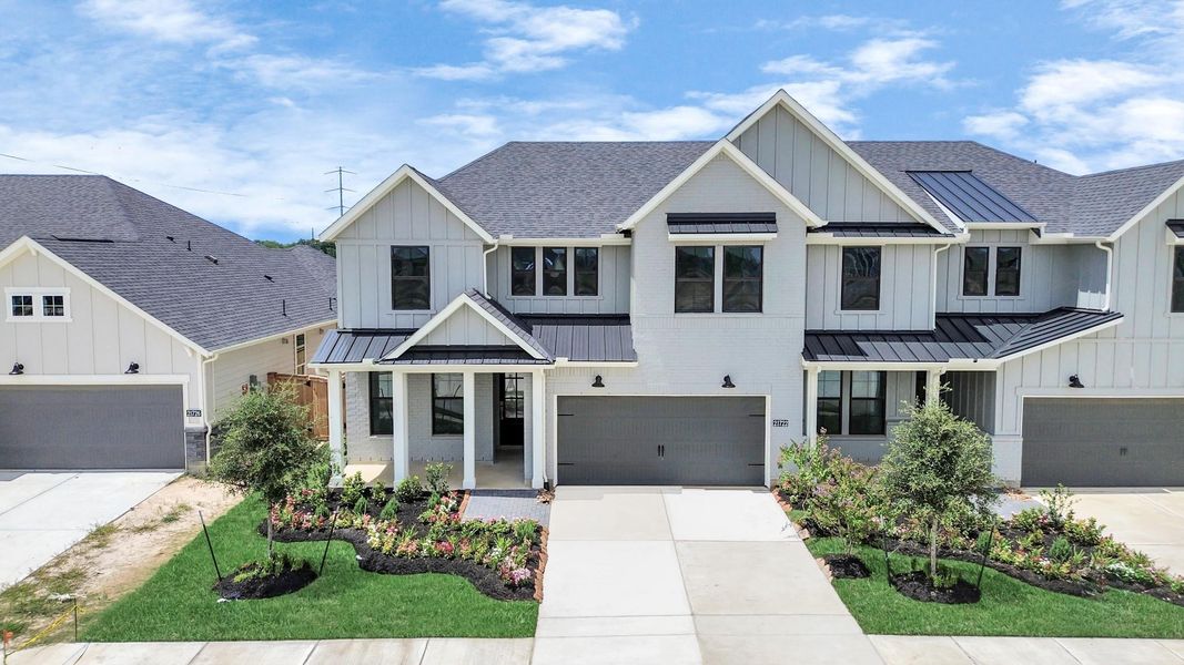 Front exterior of a new home in Bridgeland: Signature Collection, Cypress, TX, highlighting curb appeal (Image 14).