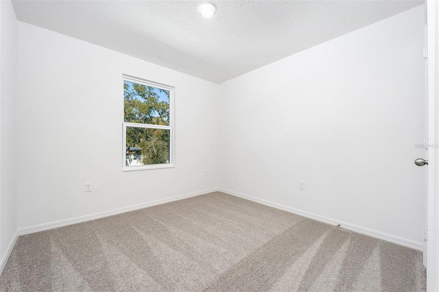 Spacious, unfurnished interior of a new home in Tula Parc, Astatula (Image 16).