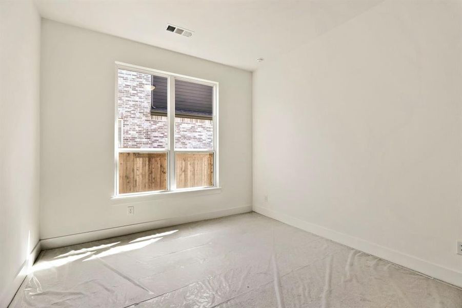 Empty room with baseboards