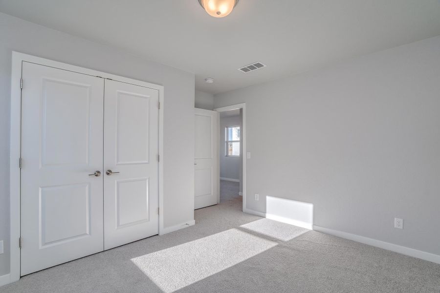 Representative unfurnished interior of a home built from the The Copperleaf by David Weekley Homes in Revel Crossing at Wolf Ranch – The Ascent Collection, Colorado Springs (Image 7).