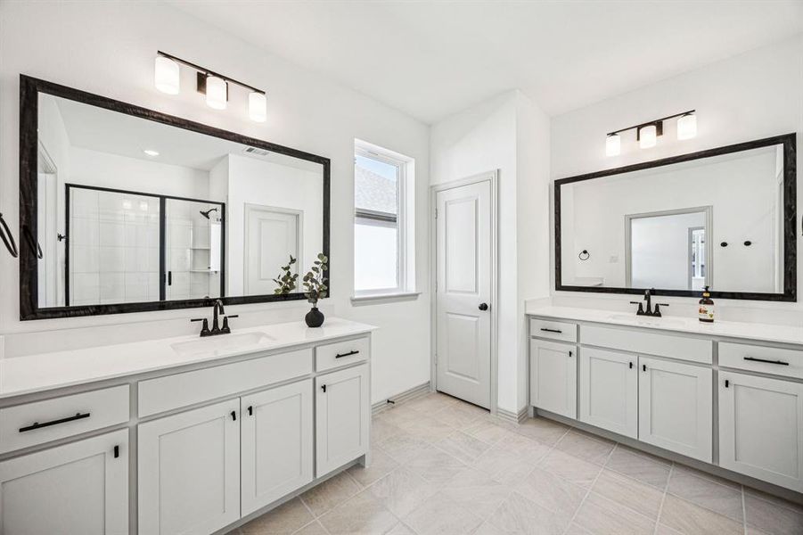 Ample room for two in this beautiful owner's bath! Ample room for two in this beautiful owner's bath!