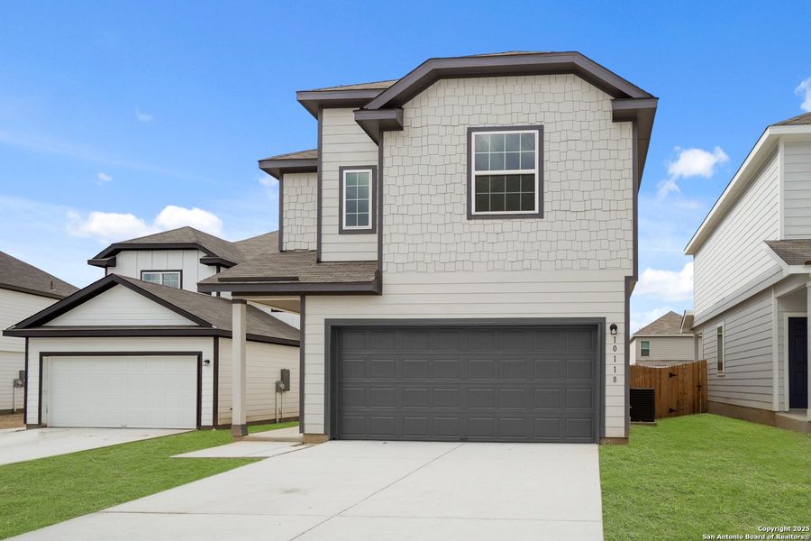 Front exterior of a new home in Melissa Ranch, San Antonio, TX, highlighting curb appeal (Image 18).
